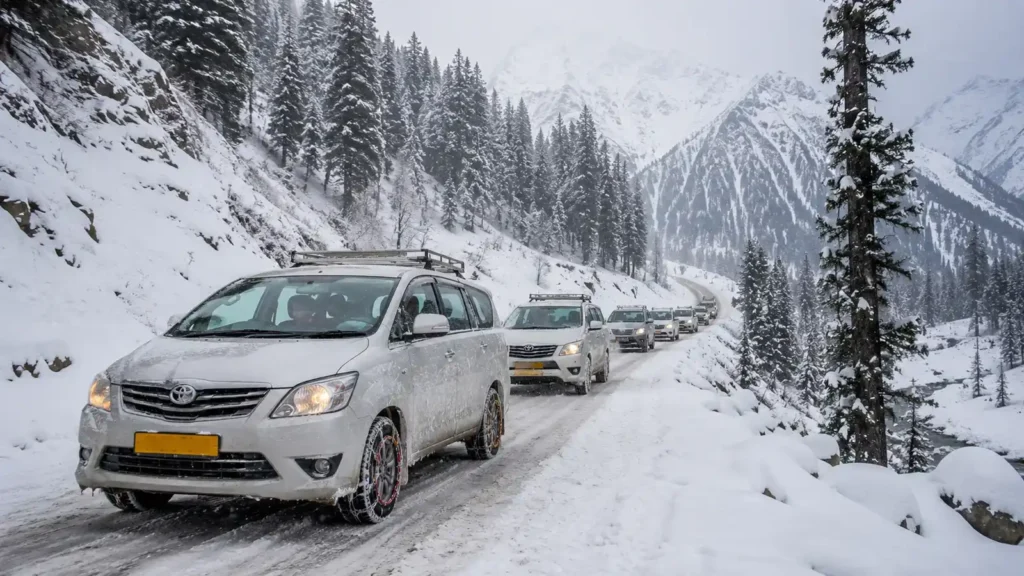 Snow chain equipped taxis driving safely on snowy roads near Sonmarg in winter- sonmarg union taxi